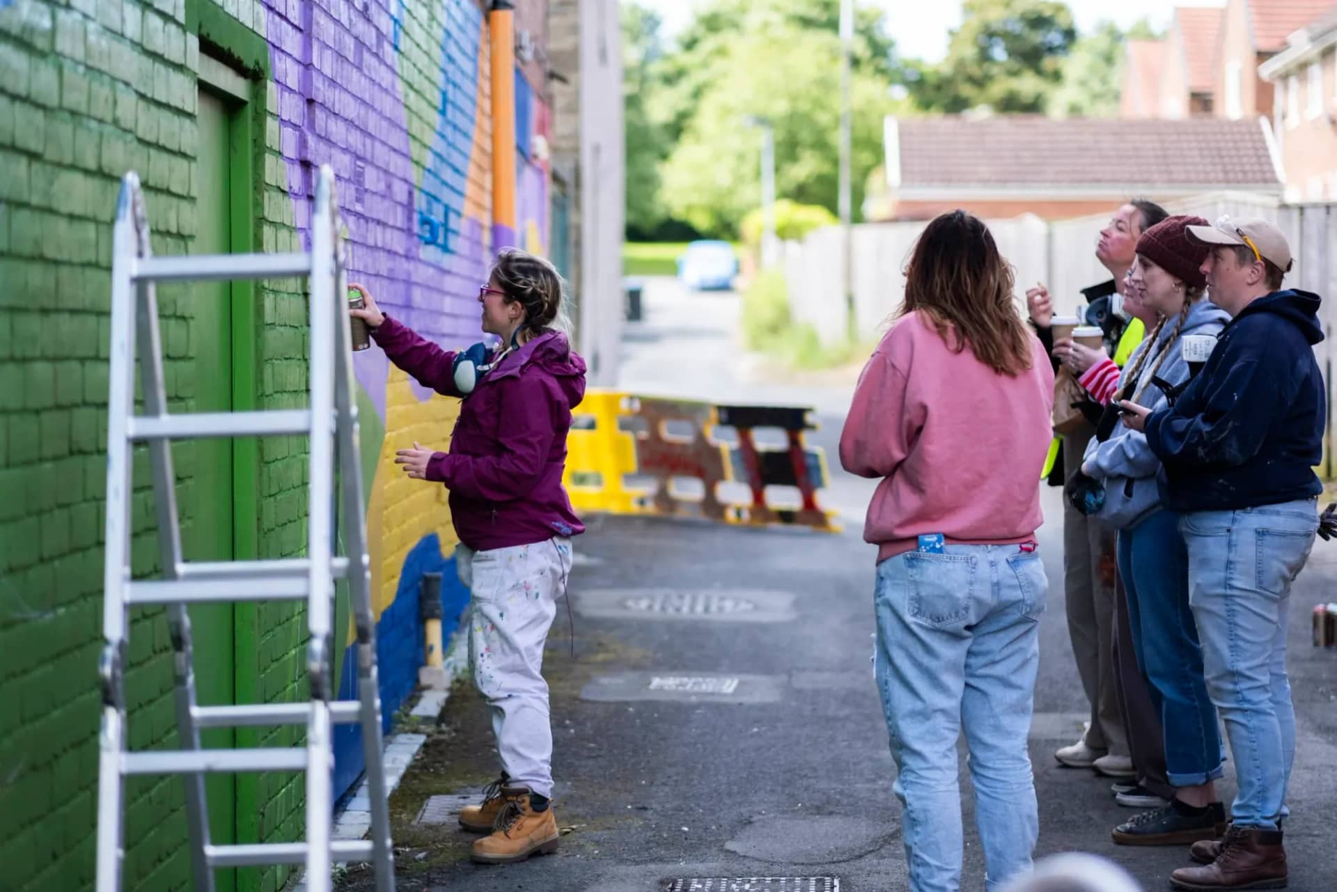 Painting a back-lane wall together